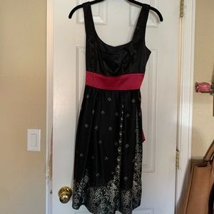 Black dress with pink belt